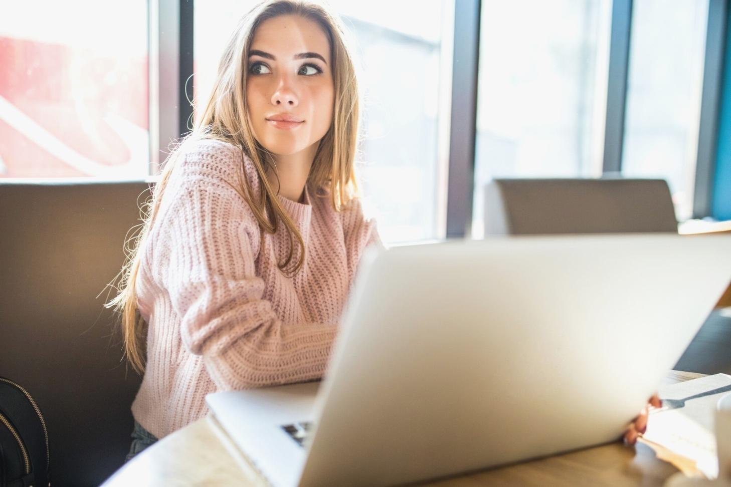 Modern office space with multiple monitors displaying blockchain network status and analytics